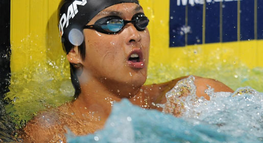 Junyo Koga of Japan looks up after winning the men's 50m backstroke final at the Pan Pacific Swimming Championships in Irvine, California.  China vow to come out on top of the Asian Games “duel in the pool” with arch-rivals Japan when competition starts on November 13.  —File Photo by AFP